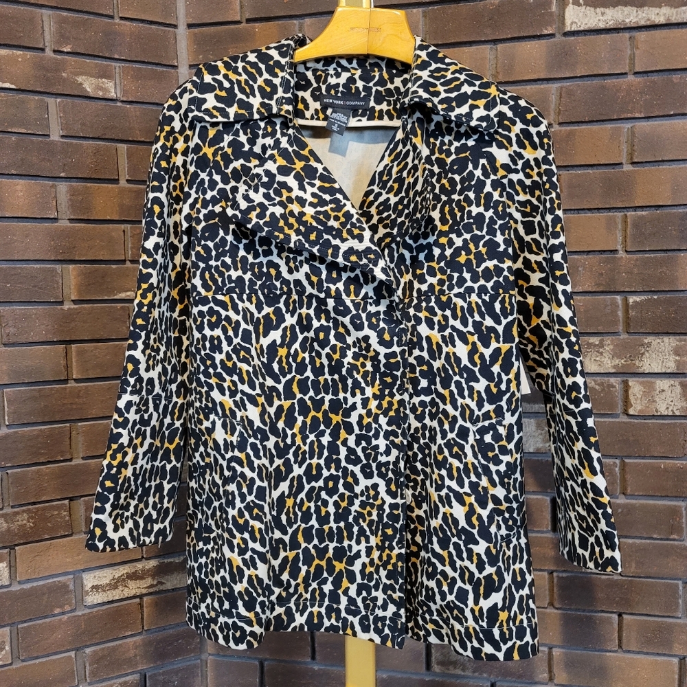 New York and Company unlined leopard print canvas snap down trench coat S